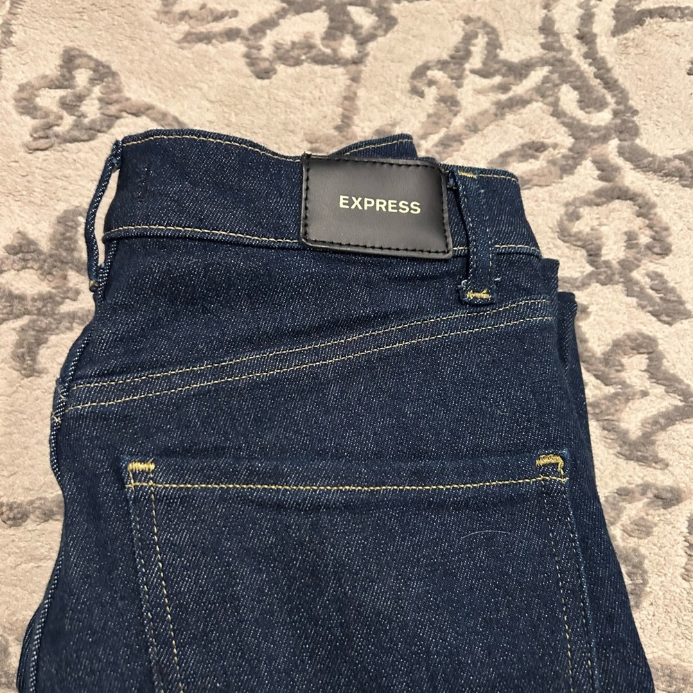 Express slim superhighrise dark wash jeans. Like new condition. Size 4R